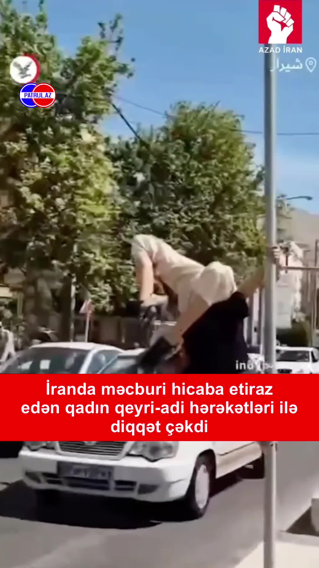 İranda məcburi hicaba etiraz edən qadın