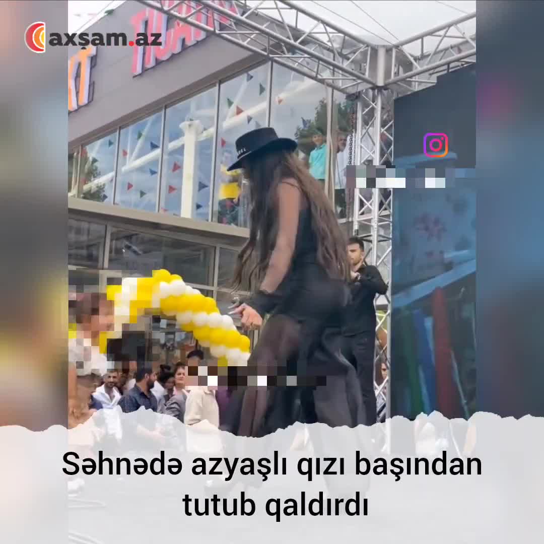 Səhnədə azyaşlı qızı başından tutub qaldırdı 