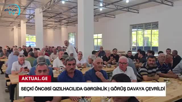 Gürcüstanda azərbaycanlı deputat seçiciyə çaynik atdı