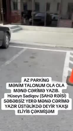 Maşını xəttə uyğun saxladı, amma yenə cərimələndi 