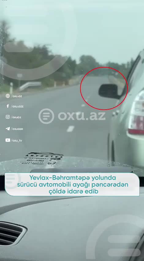 Ayağını yolboyu pəncərədən çıxaran sürücü təhlükə saçdı
