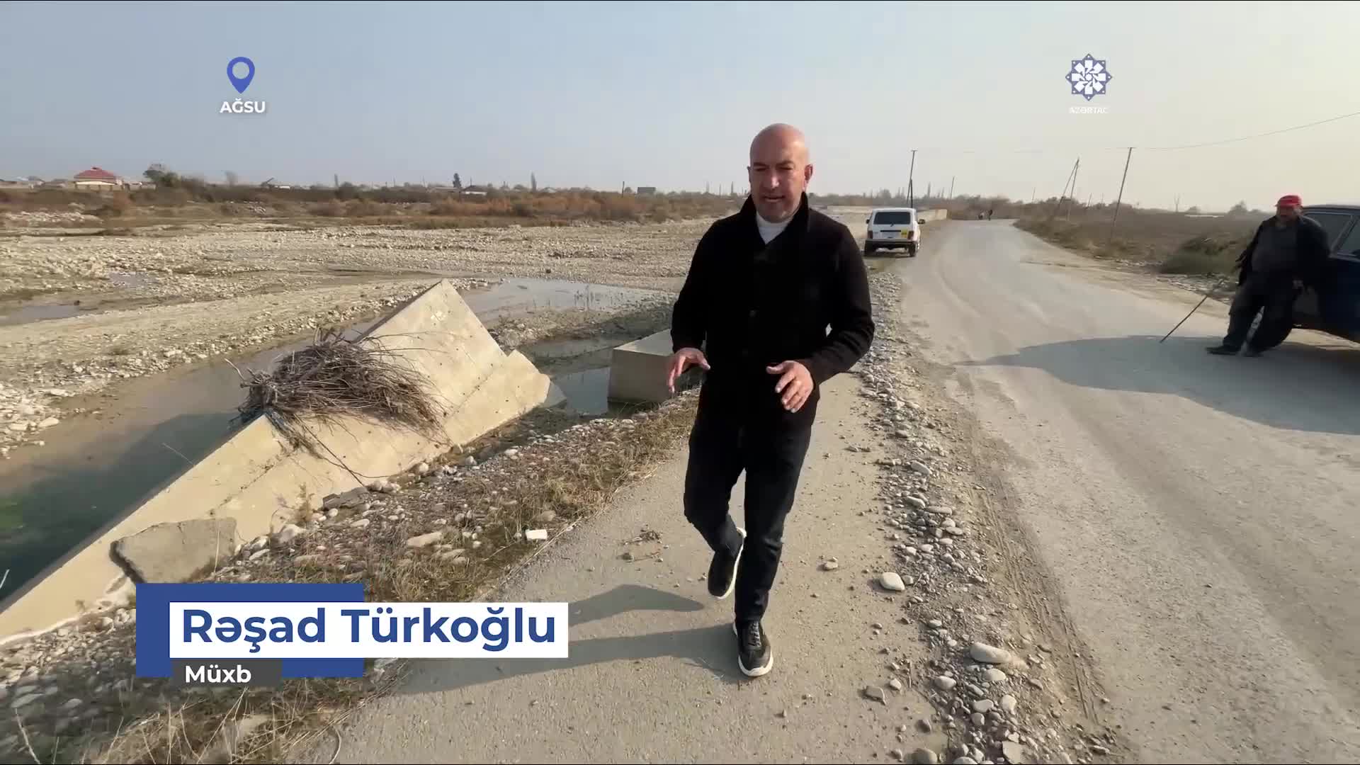 Ağsuda sel avtomobil yolunu dağıtdı