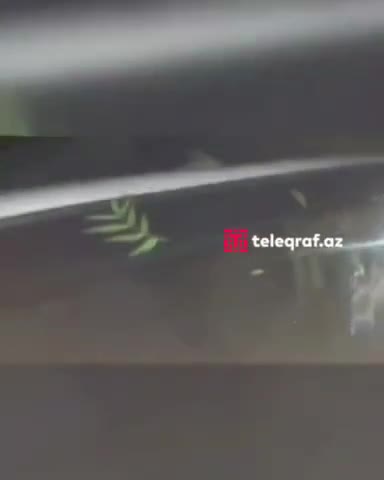 dolu evlərin dam örtüklərinə və avtomobillərə ziyan vurub
