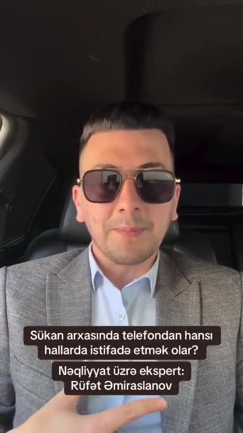 Sükan arxasında telefonla danışmağa hansı halda cərimə yazılır?